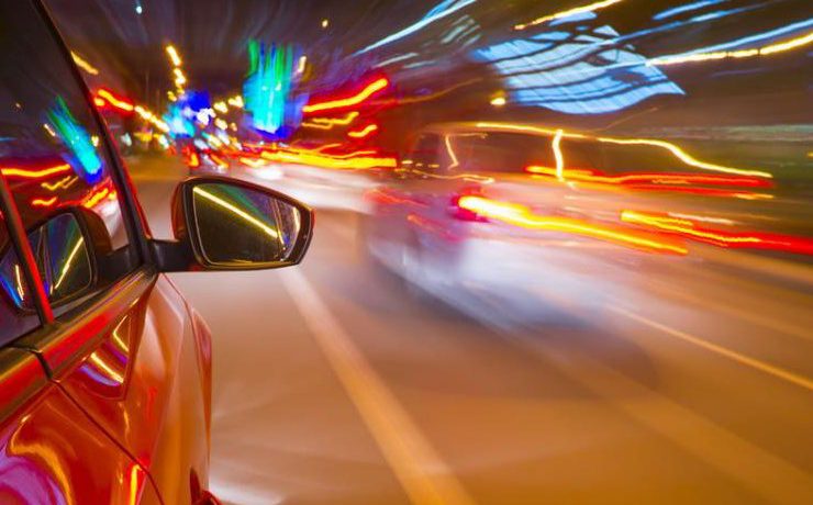 Cars on a highway going fast