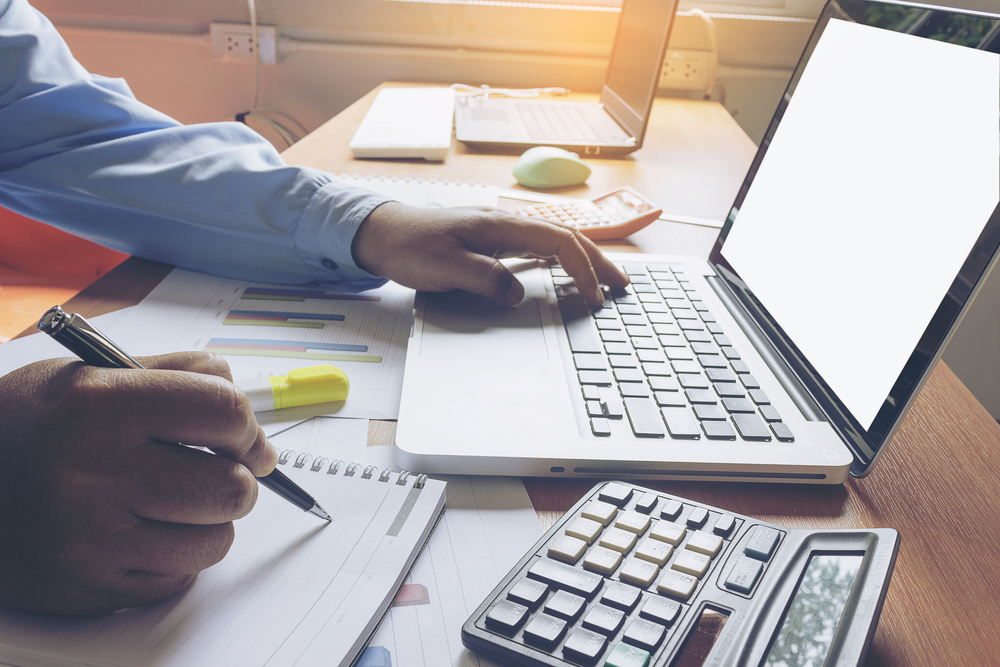 Employee sitting at a laptop working