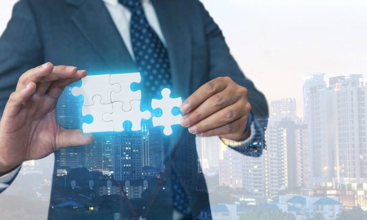 Man who is Putting the Puzzle Pieces Together