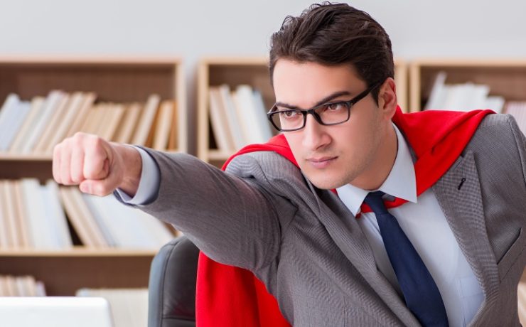 Businessman in cape saves the day