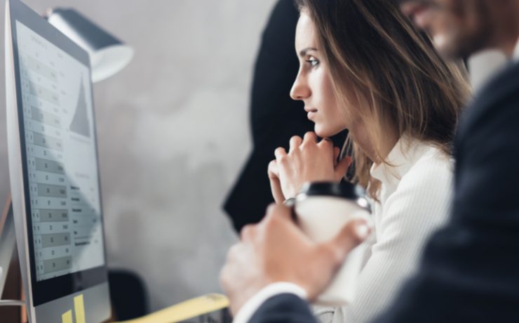 woman looking at computer screen