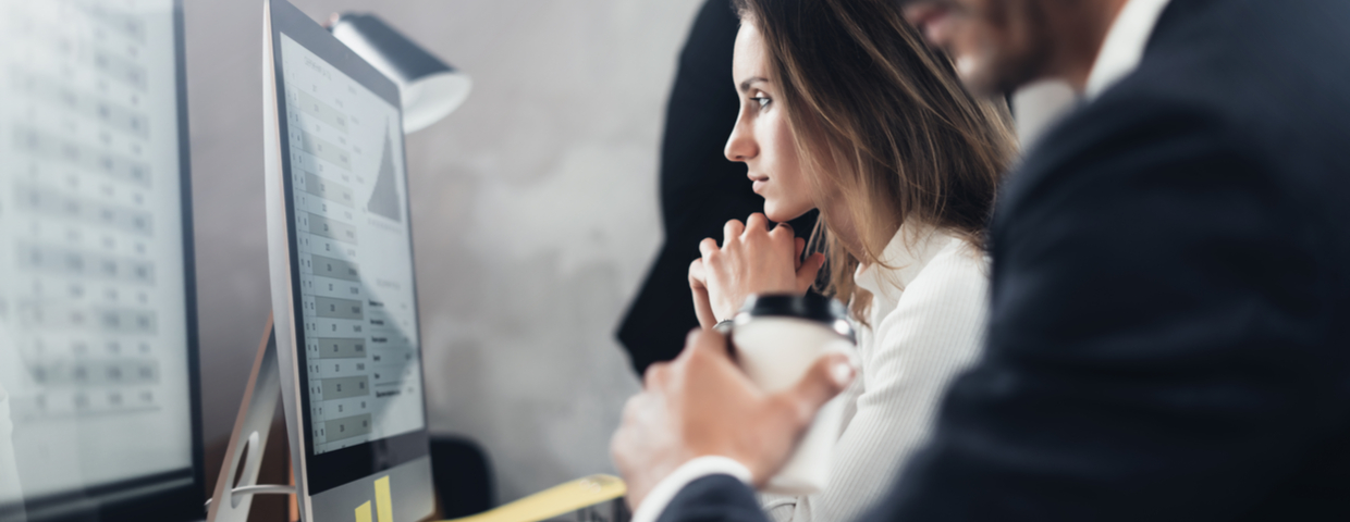 woman looking at computer screen