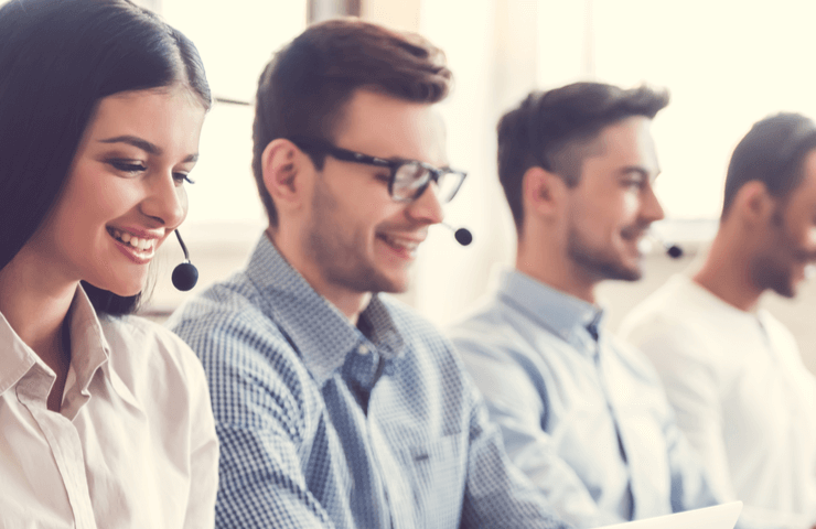 IT services providers talking on headsets