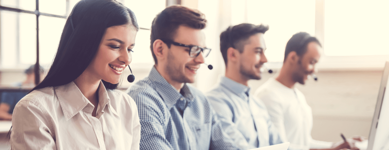 IT services providers talking on headsets